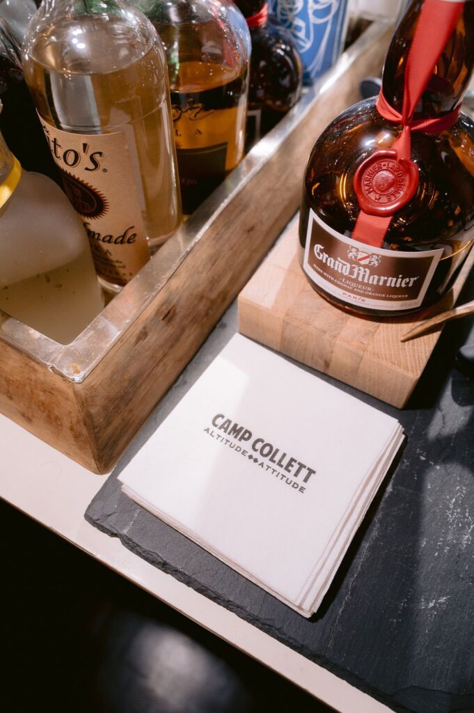 close up of the bar setup in the hotel jerome aspen restaurant during a wedding