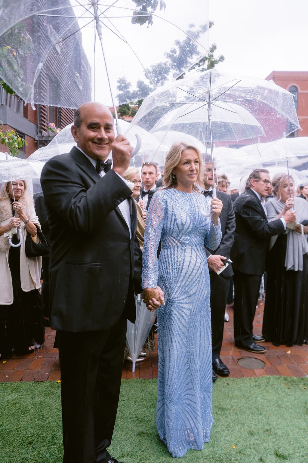couple standing hand in hand at a ​aspen jerome hotel wedding ceremony