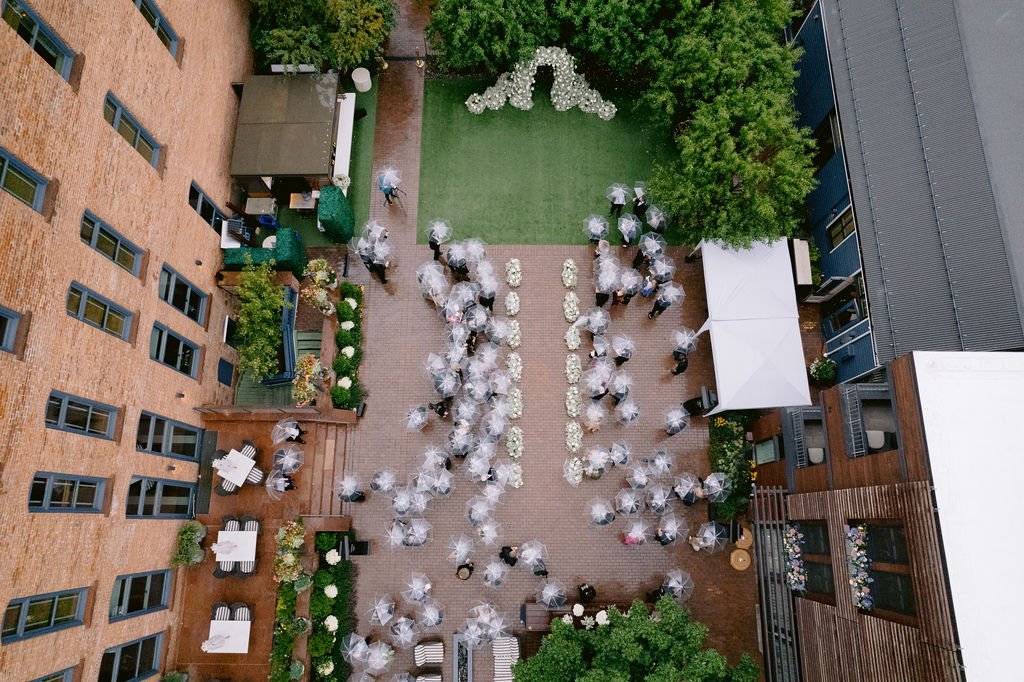aerial shot of hotel jerome aspen during a wedding ceremony