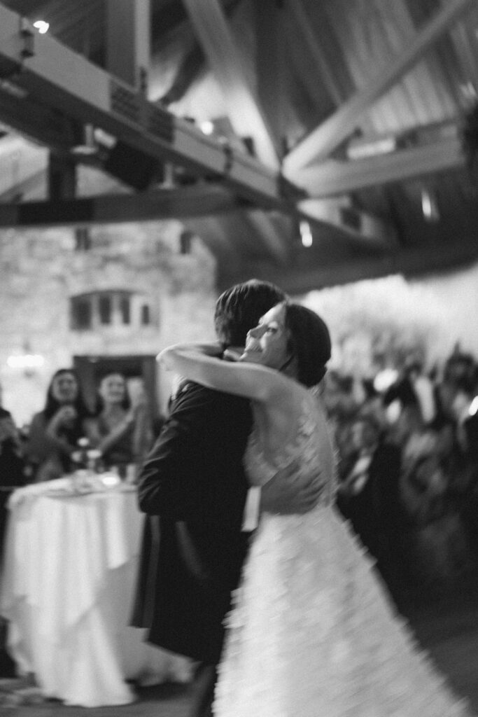 candid image of a bride and groom dancing at their reception during their old edwards inn wedding