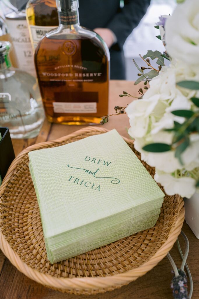 light geen serviettes with Drew and Tricia writtten on them for a Piermont Cottage rehearsel dinner at Old Edwards Inn and Spa