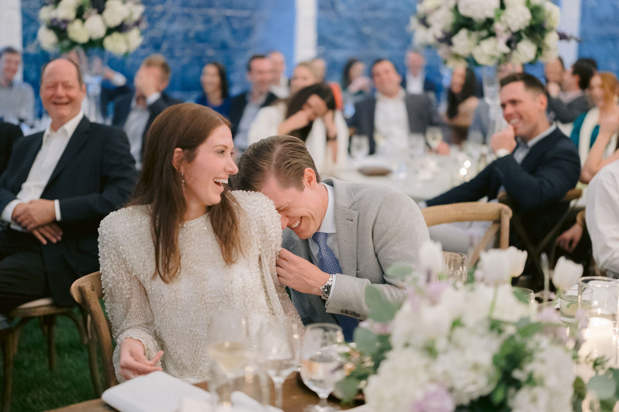 bride and groom laughing at their Piermont Cottage rehearsal dinner at Old Edwards Inn and Spa