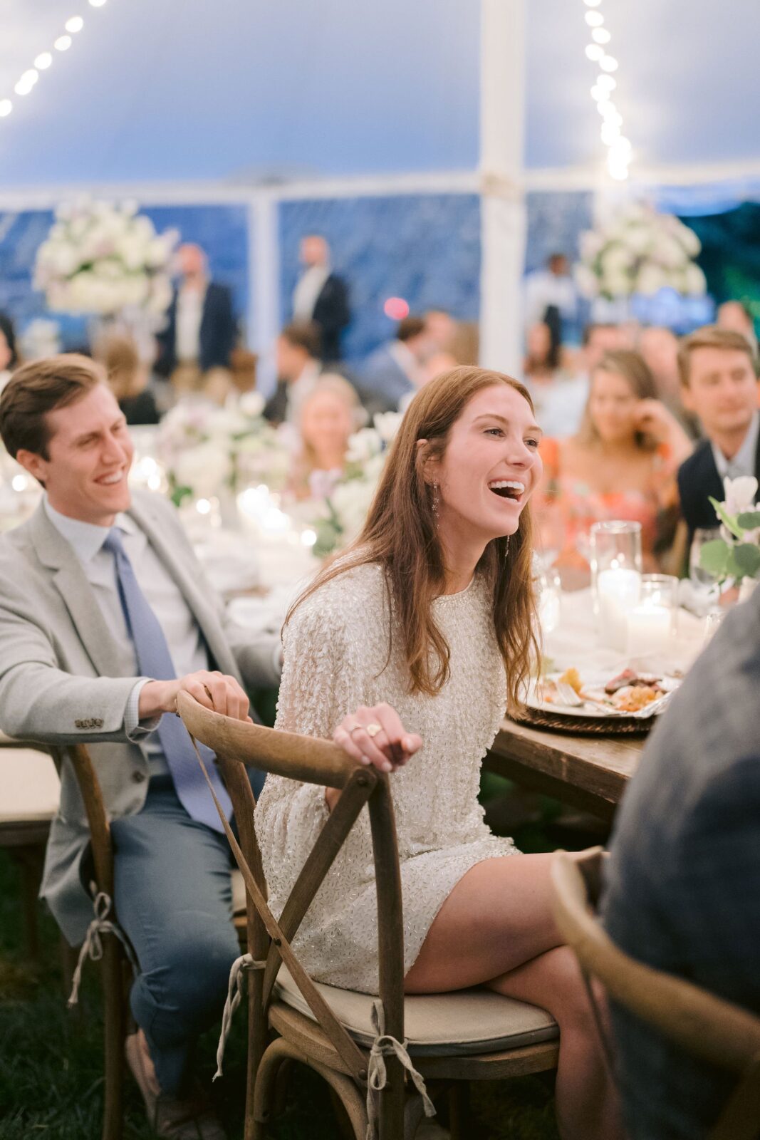bride and groom laughing at their Piermont Cottage rehearsal dinner at Old Edwards Inn and Spa