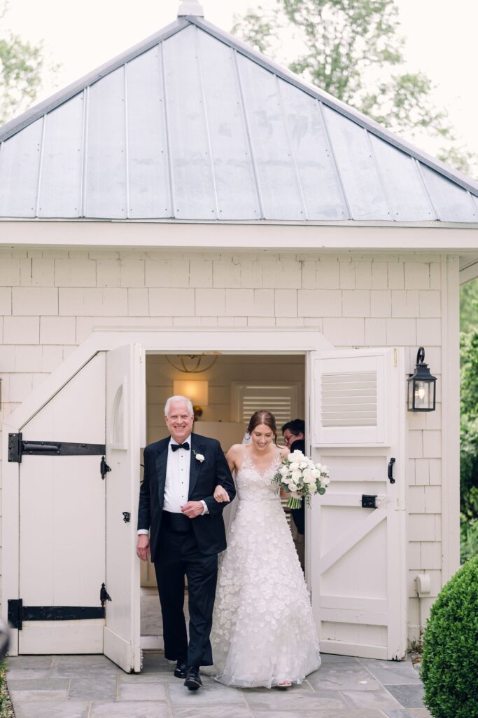father and bride getting ready to walk down the aisle during her old edwards inn wedding