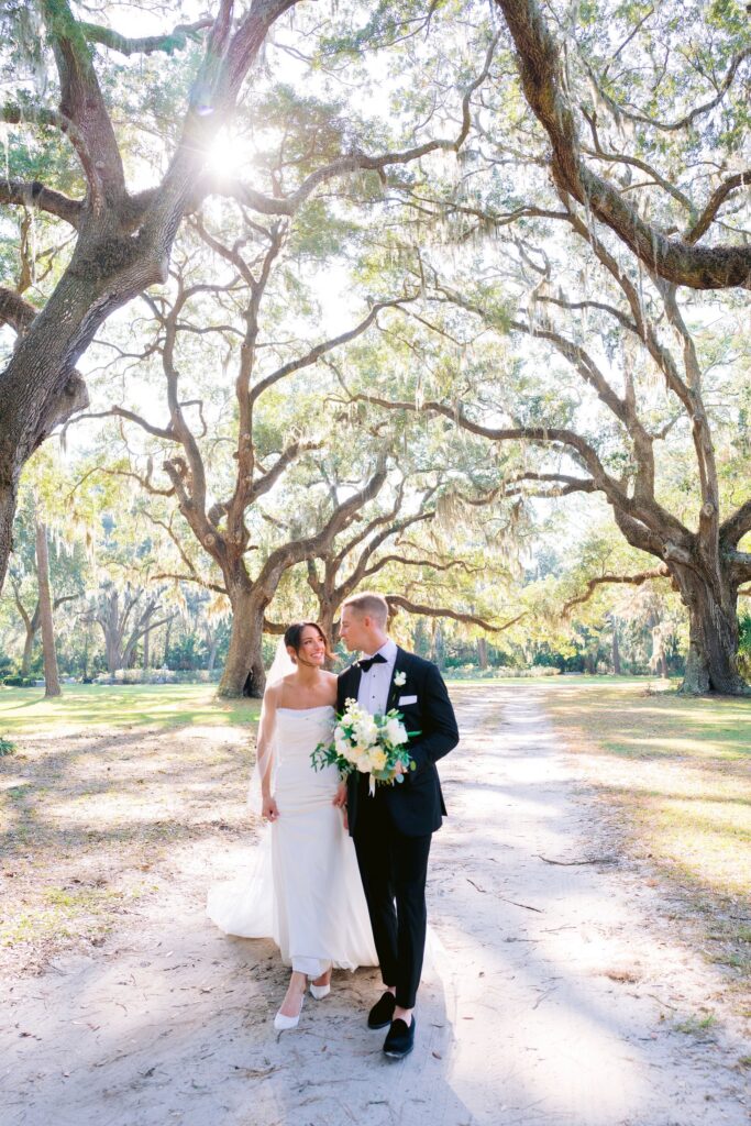 portrait of bride and groom by laura stone photo at the Six Oaks Cemetery before their sea pines resort wedding ceremony