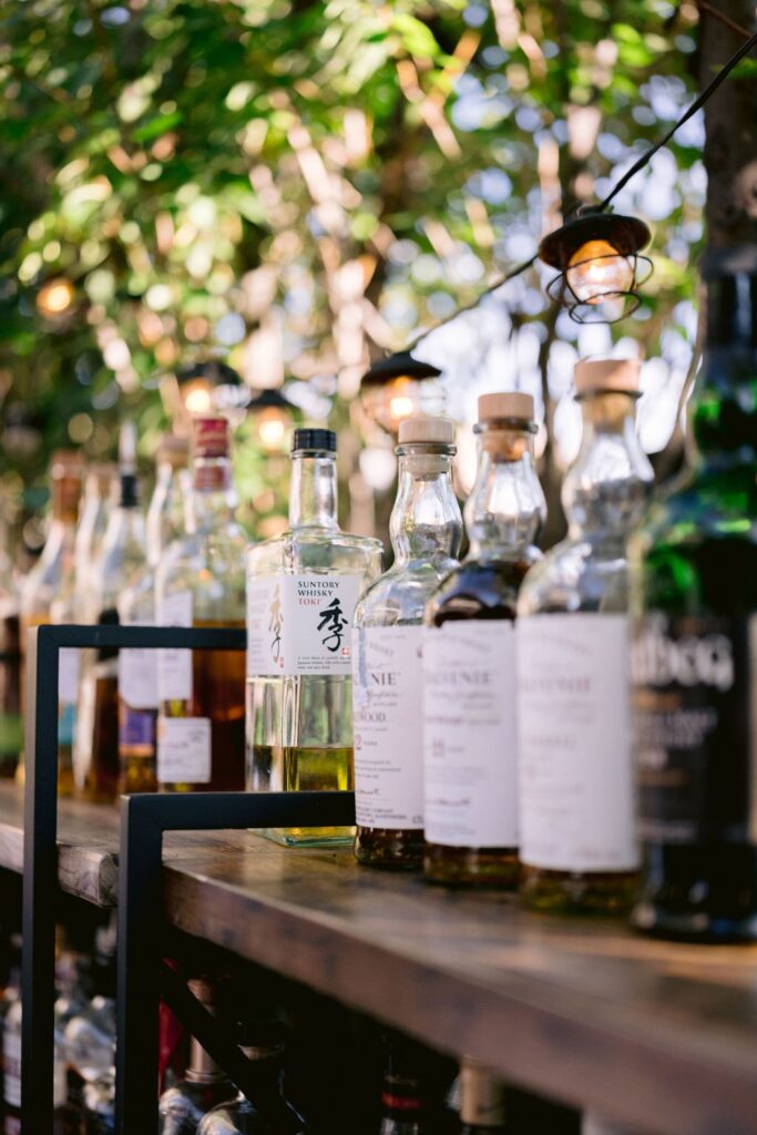 bottles of liquor standing on a bar during an aspen resort wedding