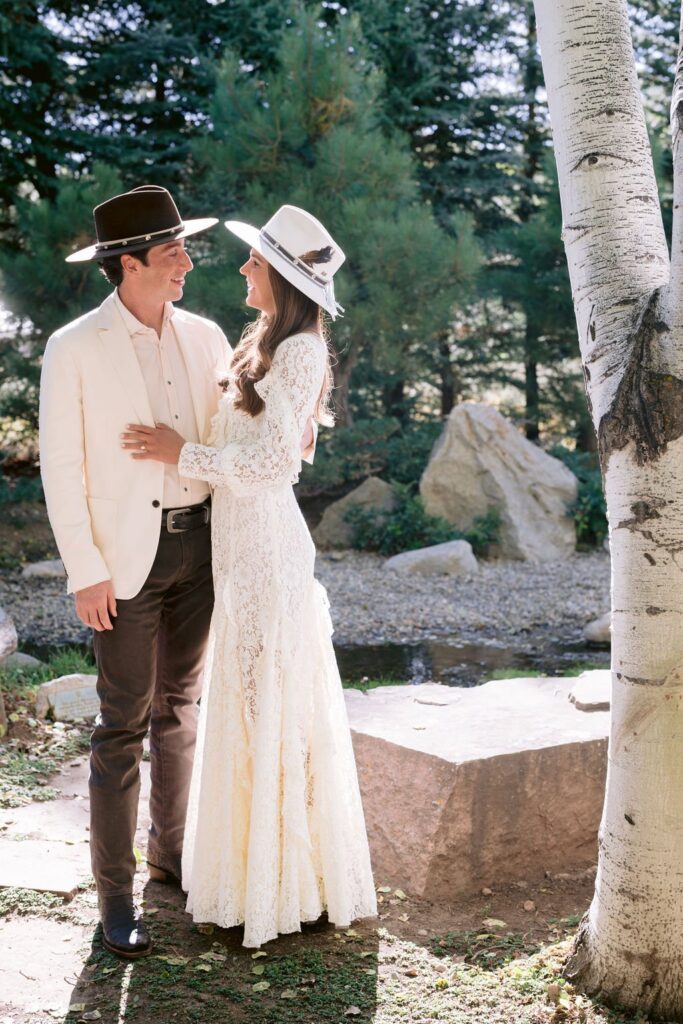 bride and groom staring lovingly into each other's eyes at their aspen meadows resort wedding