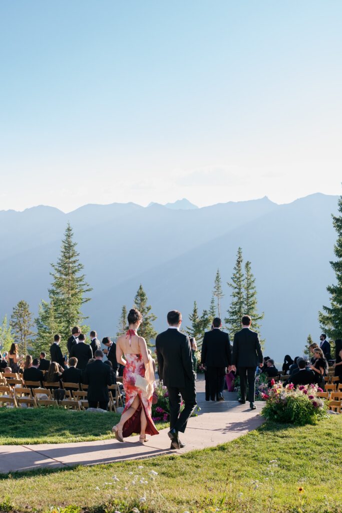 guests arriving for a luxury wedding in Aspen at an aspen mountain wedding ceremony site with stunning backdrops
