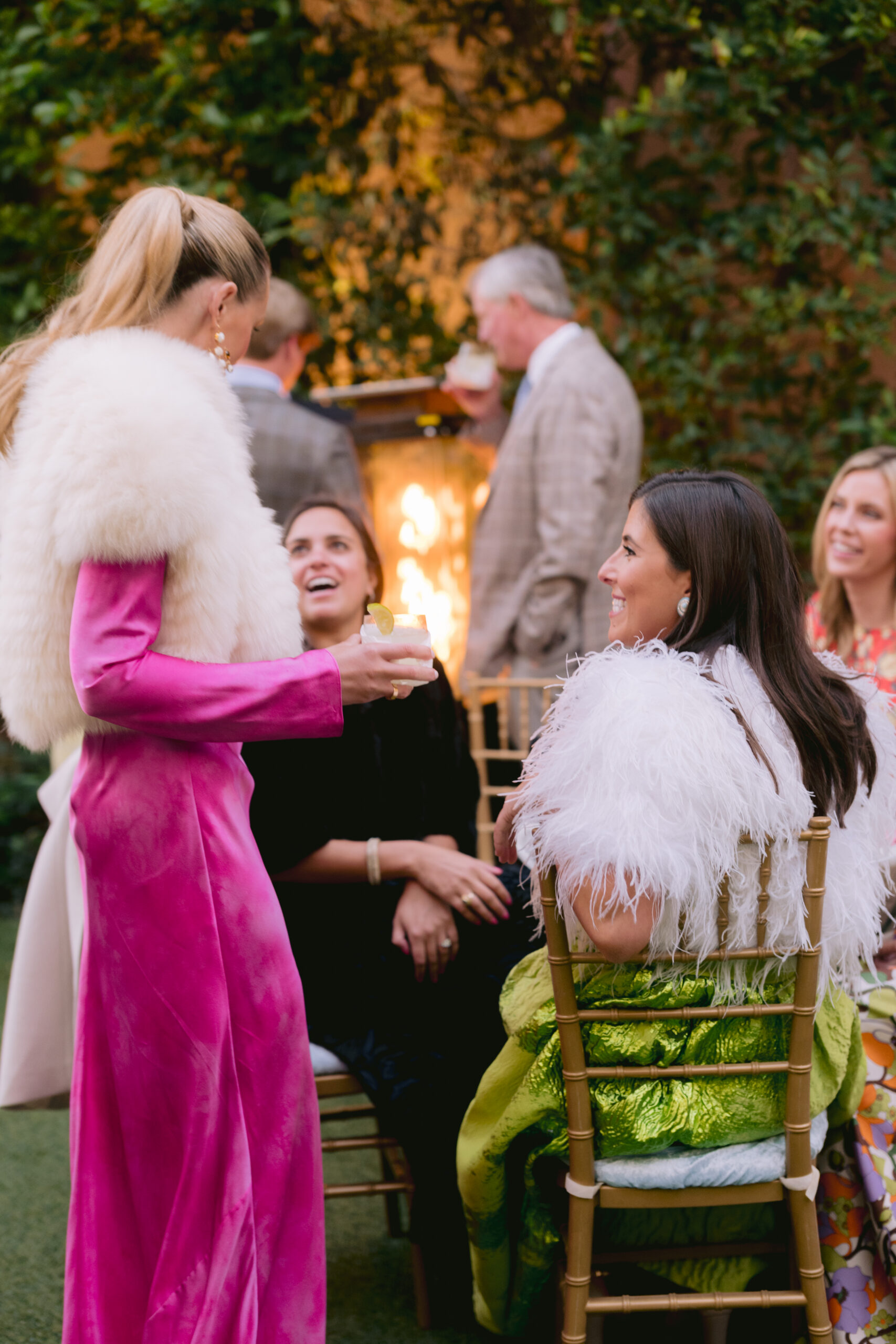 bride mingling with guests during her welcome party at the colony hotel, palm beach, fl