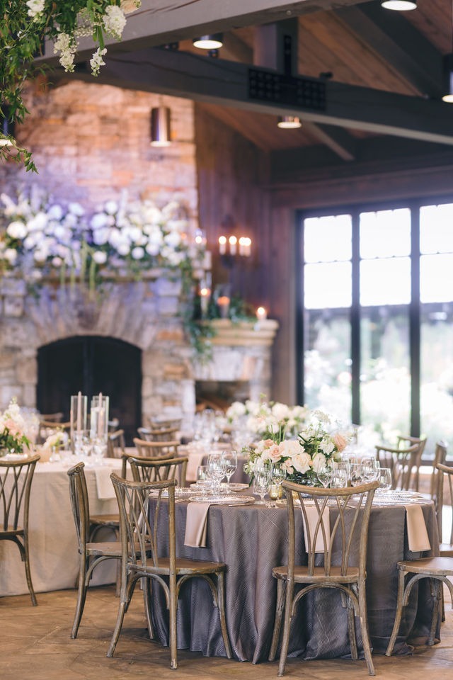wedding reception space wit round table setup at old edwards half-mile farm