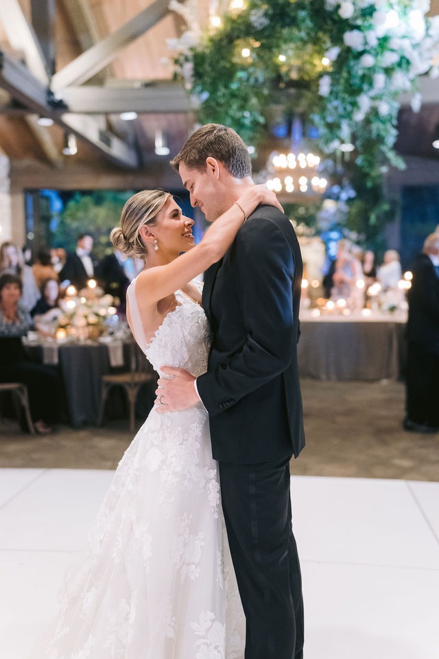 bride and groom during their first dance at their half-mile farm wedding reception space