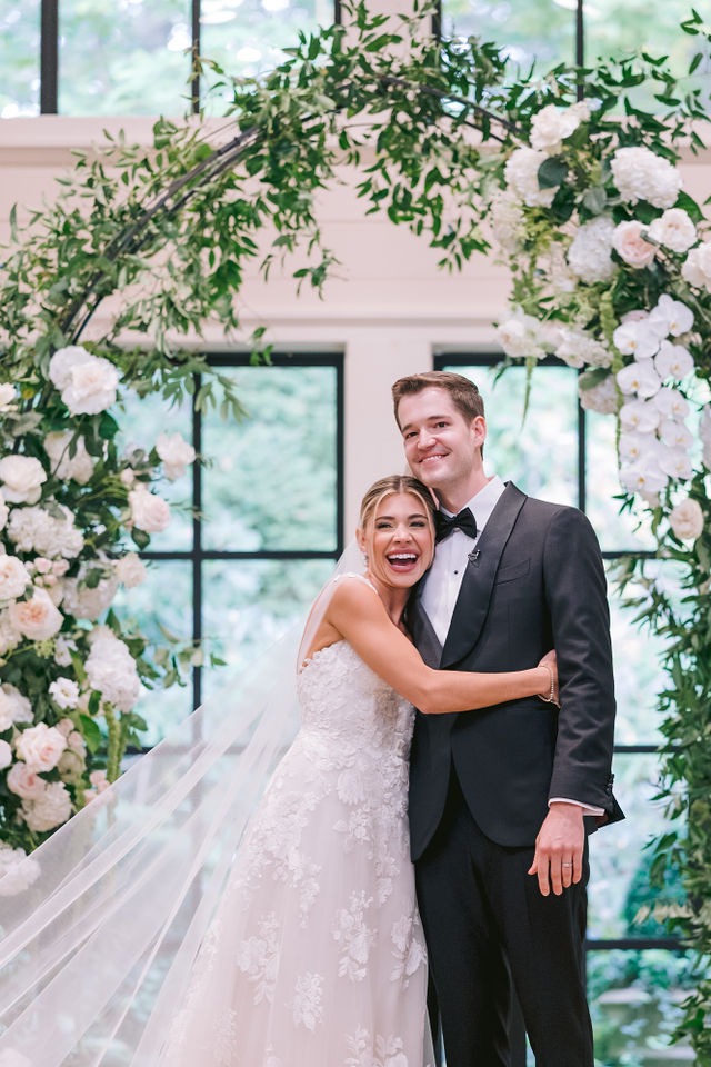 bride and groom celebrating getting married at half-mile farm north carolina