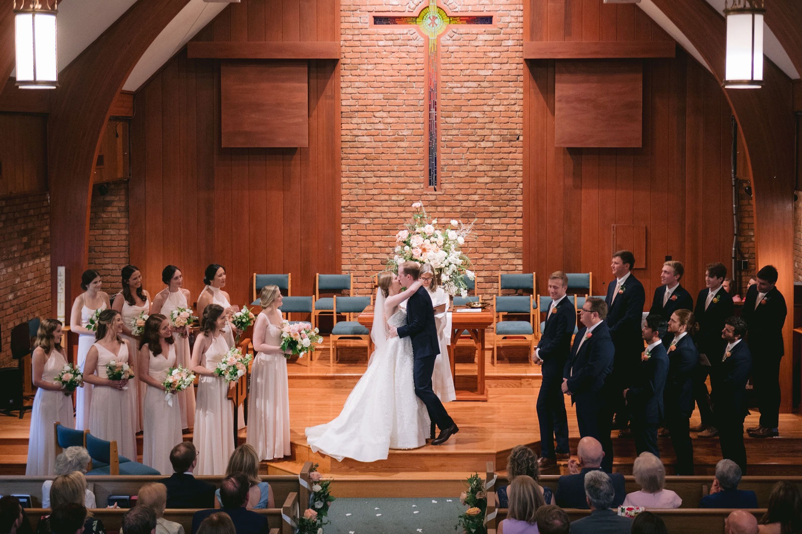 bride and groom kissing after getting married at their chosen highlands wedding venue