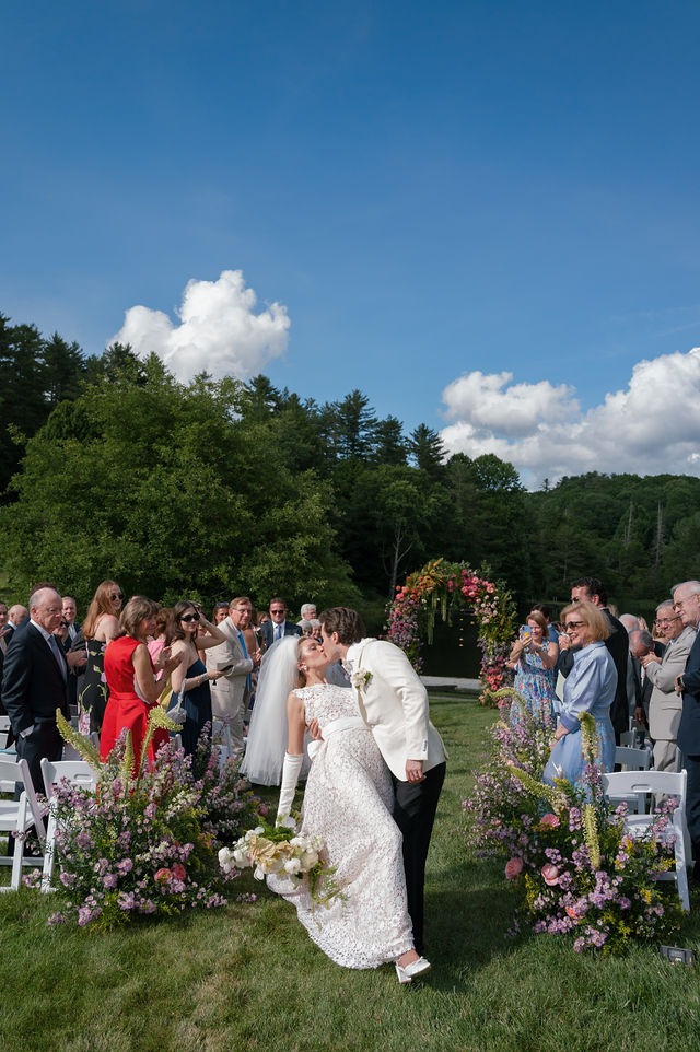 portrait of a bride and groom kissing after getting married at old edwards half mile farm