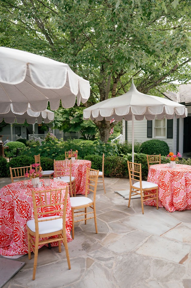 round table setup for cocktail hour at an old edwards inn half mile farm outdoor wedding