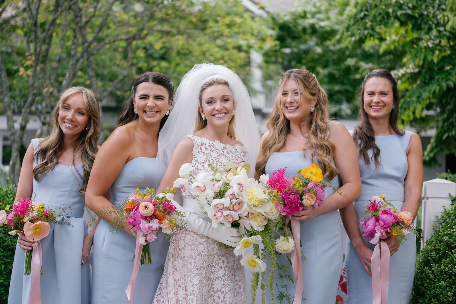 portrait of a bride and her bridesmaids at half mile farm by old edwards