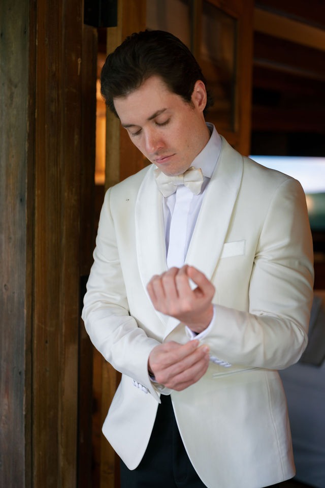 groom getting ready for his wedding at old edwards half mile farm