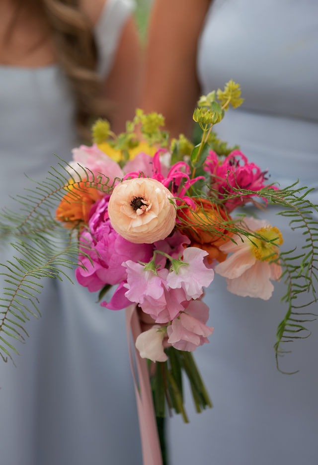 closeup of a bridesmaids flower bouquet that she held at an half mile farm wedding