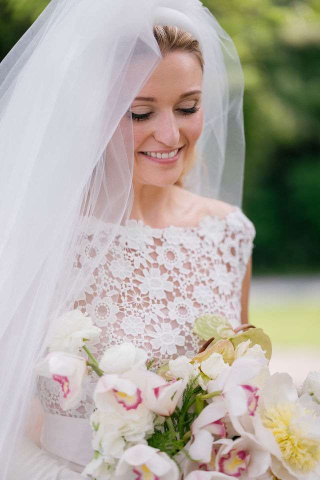 portrait of a smiling bride during her portrait session at her half mile farm old edwards wedding