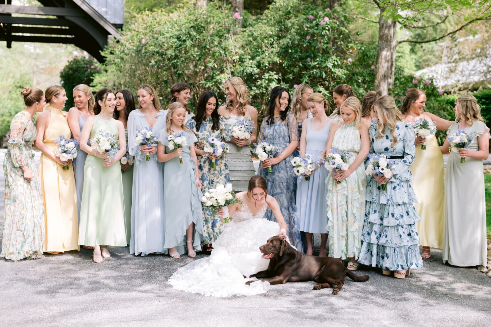 dresses-dog.jpg
Bride with her dog surrounded by bridesmaids in pastel blue, green, yellow, and floral dresses.